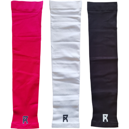 Reyrr Compression Arm Sleeves in pink, white, and black made of breathable, elastic, sweat-wicking fabric with UV protection sold in pairs.