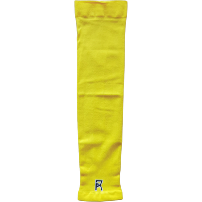 Yellow Reyrr compression arm sleeve made of breathable, sweat-wicking, and elastic fabric with a small logo near the wrist.
